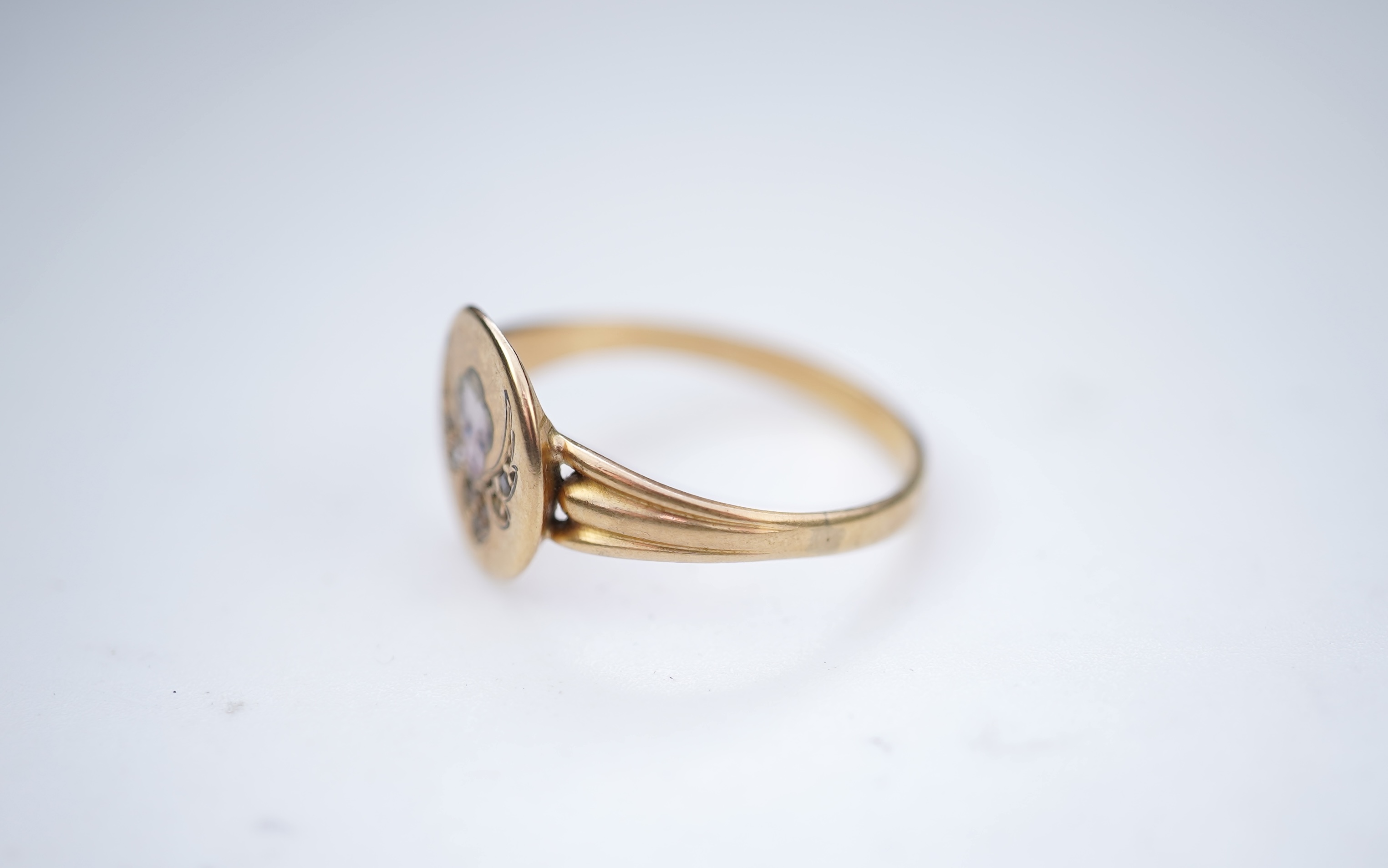 A gold, enamel and diamond signet ring, circa 1900